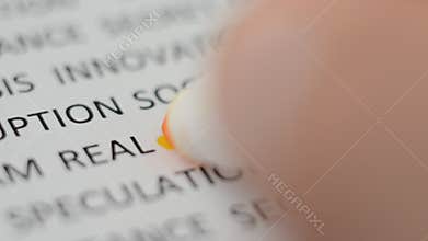 Macro shot highlighting the word `IDEA` with a yellow marker