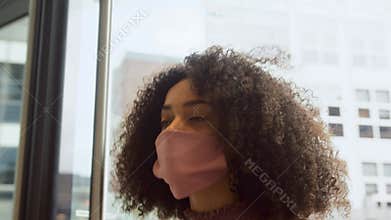 Young Mixed Race Businesswoman Wearing Face Mask Entering Office Building During Covid-19 Pandemic