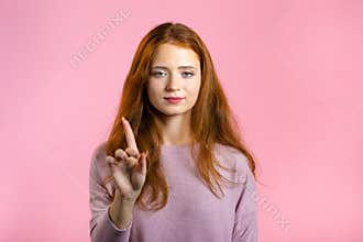 Woman disapproving with No finger Sign Make Negation Finger Gesture. Attention, Denying, Rejecting, Disagree, Portrait