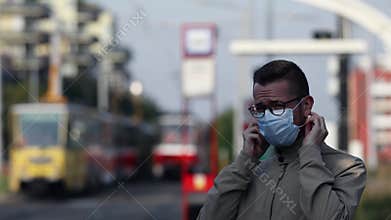 Man wearing face mask in public transportation