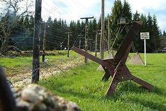 Part of the fence on borders with barbed wires
