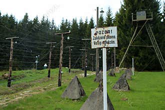 Part of the fence on borders with barbed wires