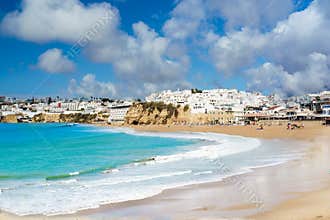Landscape with old town Albufeira and sandy city beaches