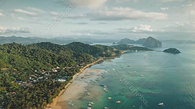 Tropic Philippines cityscape at ocean bay harbor aerial view. Boats, vessels, yachts at sea water