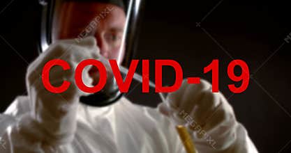 Red letters covid 19 as a warning about infection and a global pandemic. In the background, a male virologist collects