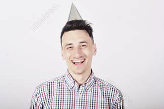 Happy birthday man. The guy in the cap is smiling laughing