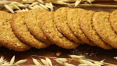 Row of fresh baked oat cookies close up