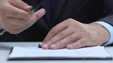 Notary public proposing client to sign up document, consulting service, law