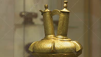 Golden dish artifact