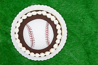 Blank baseball cake on a green fake grass