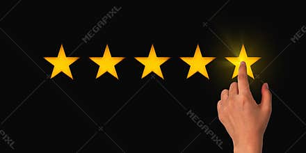 A woman clicks on a star rating, the concept of a positive rating, reviews and feedback