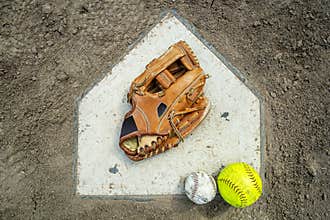 Homeplate with baseball glove and balls
