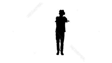 Silhouette Casual gamer dancing locking hip-hop in VR headset playing dancing game.