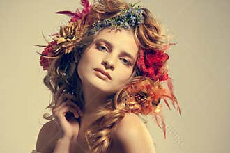 Beautiful woman with flowers in her hair