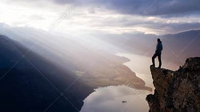 Cinemagraph Continuous Loop Animation of a Man on top of a Mountain Cliff