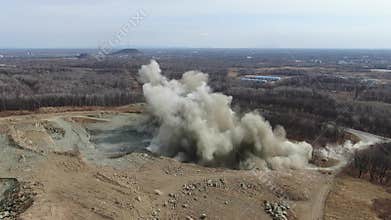 Blast in open cast mining quarry .