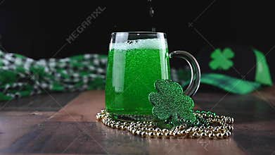 Pouring green beer on St Patricks Day - Slo Mo