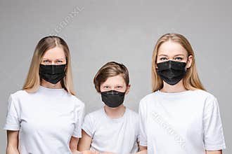 Little kid and ladies wearing medicine healthcare mask in studio