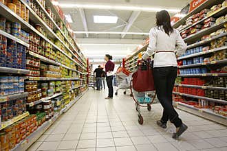 Customers shopping at supermarket