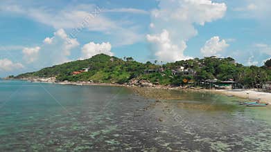Fly abode boats at coastline of Koh Phangan island in Thailand