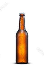 500ml brown beer beer bottle with drops isolated on a white background