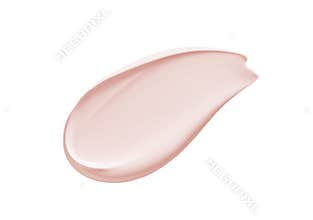 Pink peach cosmetic cream swatch smear. Color correcting concealer, makeup primer sample isolated on white