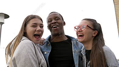 Young people of different nationalities have fun together. No Racial Feud. BLM.