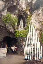 Candles in front of the cave at Massabielle in Lourdes