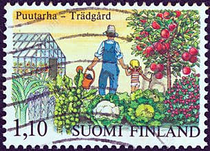 FINLAND - CIRCA 1982: A stamp printed in Finland from the `Centenary of first Finnish horticultural society` issue shows a man and