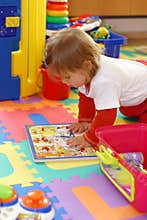 Baby playing with toys