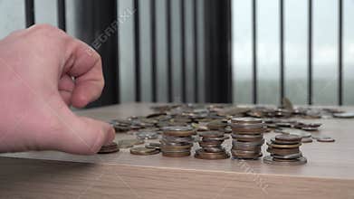 Flicked finger touch toss hit strikes a lot of many various coins of different