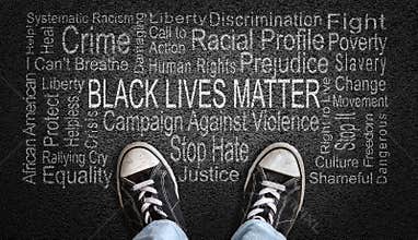 Black Lives Matter Word Cloud on Asphalt Concept of Fighting Racism