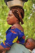 african women with baby on the back