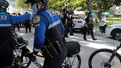 Miami Downtown, FL, USA - MAY 31, 2020: Bike Patrol in City of Miami. US protest live. Police and protesters in Florida