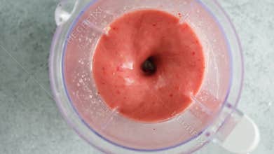 Strawberry smoothie in blender