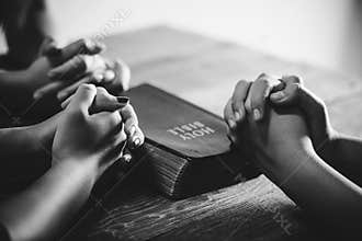 Black and white of group people praying worship believe