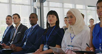 Side view of an audience at a seminar