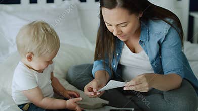 Video of woman and her little son browsing ultrasound images
