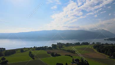 Areal shot of lake zug and rig over the golf course von HolzhÃ¤usern, Switzerland