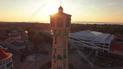 Siofok, water tower on the main square at sunset