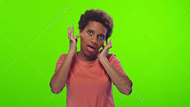 Stressed African American woman clenches teeth, doesn`t want to listen anything