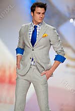 Model wears clothes made by Ego Men's Fashion