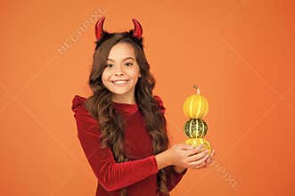 Decorations for holidays. Grocery shop. Autumn holidays. Pumpkins traditional attribute of fall holidays. Happy holidays
