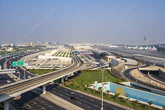 View of a Dubai international Airport, terminal 3. Terminal 3 metro station. Airport road. UAE