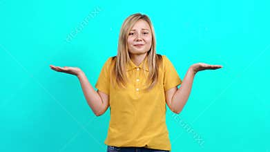 The modest embarrassed young woman says ups and looks blindly at the camera