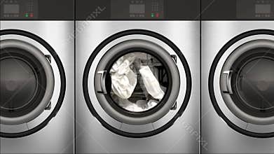 4K Slow Motion Commercial Dryers Full of Bright White Towels