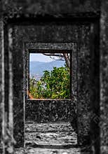 Green mountain view from ruins of fort