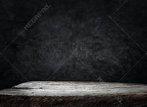 Empty wood table top counter on dark wall background.For create product display or design key visual