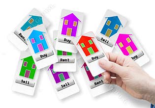 Buy a new house - Hand of a woman holding a ticket