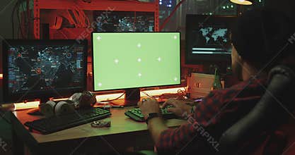 Hackers working at their desks